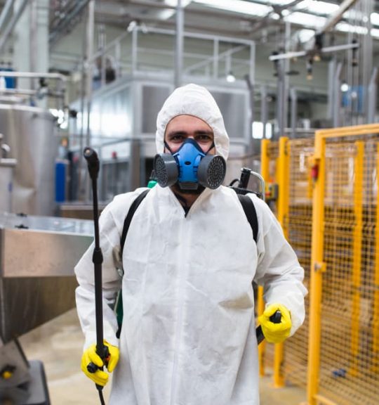 Pest Control Worker Hand Holding Sprayer For Spraying Pesticides in production or manufacturing factory — Surekil Pest Control In Burleigh Heads, QLD
